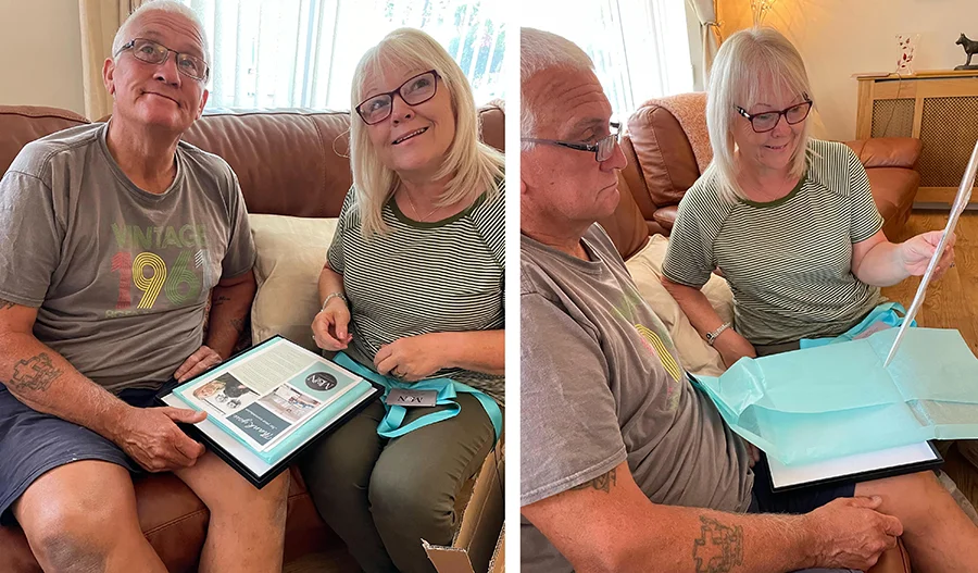 Kegan's Portrait Being Opened by Delighted Parents Parents reacting emotionally to opening Kegan's pet portrait, close to tears.